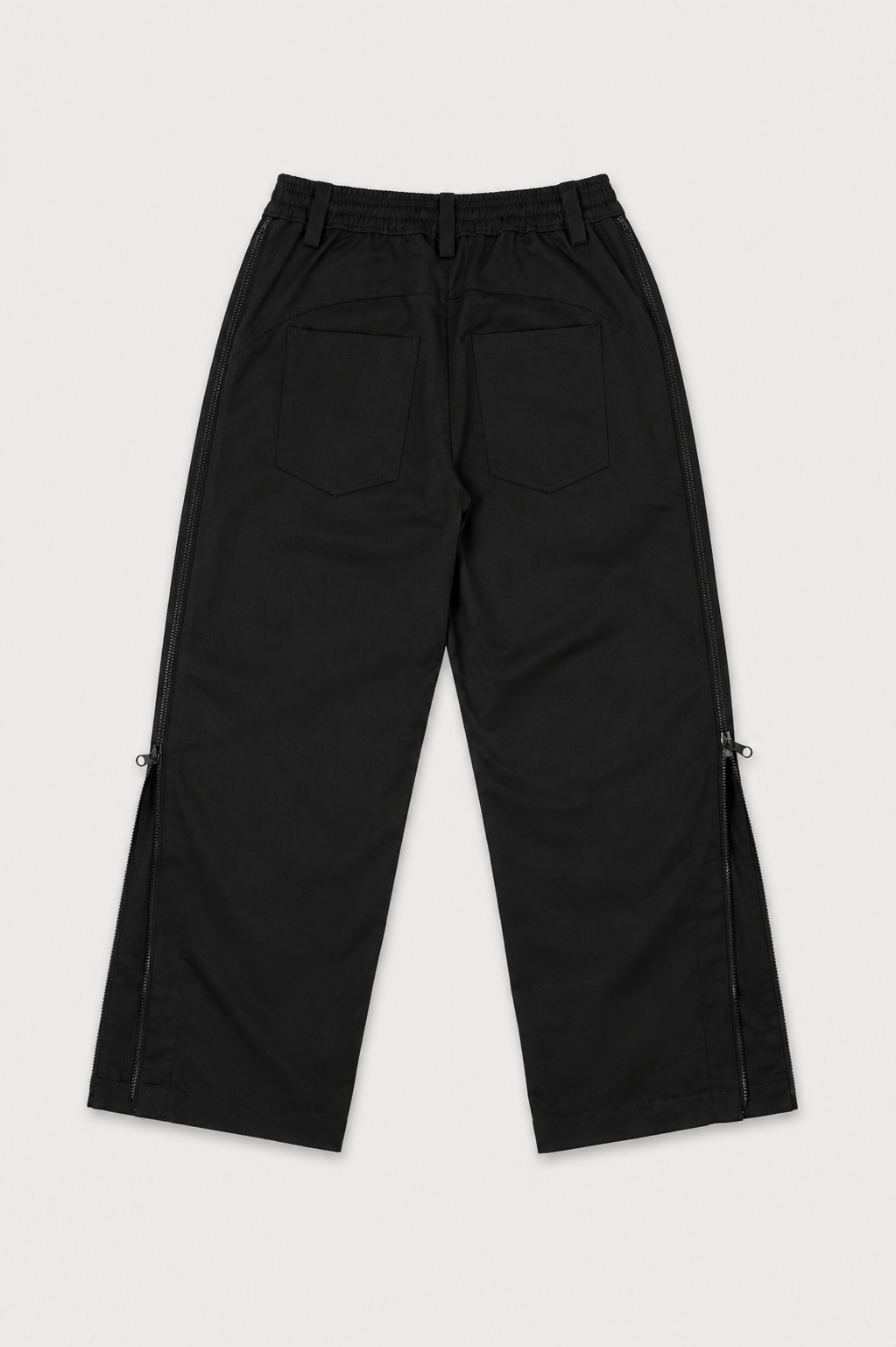 PANTALON CON CIERRES METANOIA