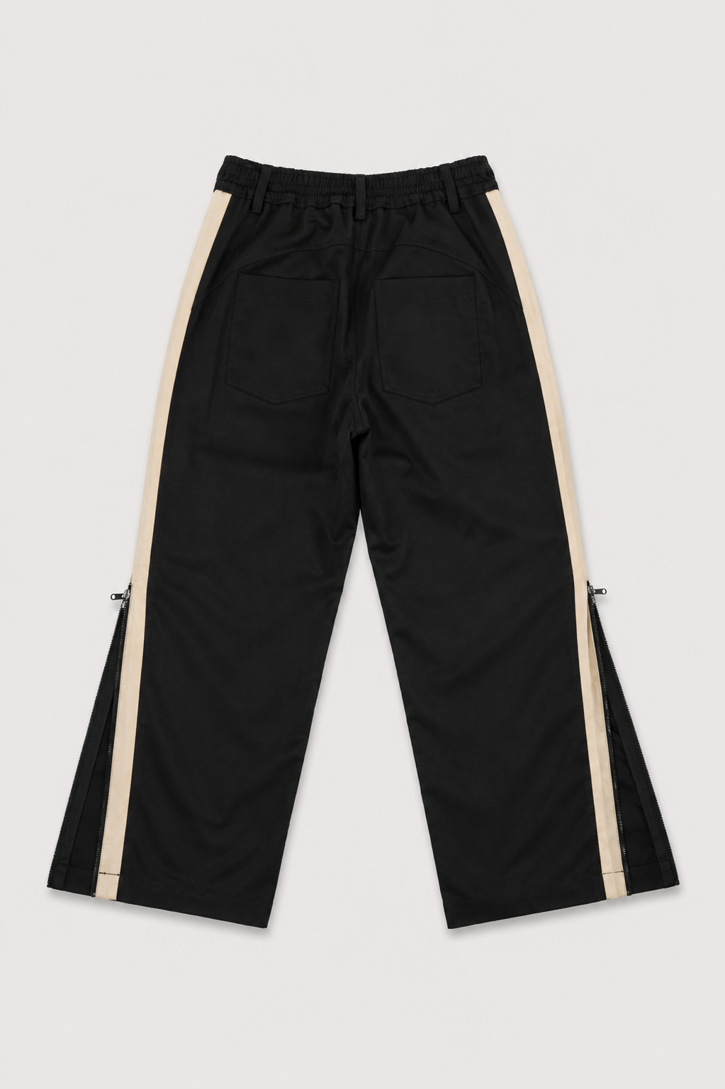 PANTALON CON CIERRES METANOIA